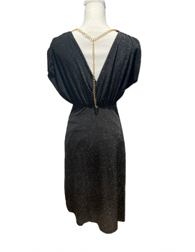 A glittering dance dress for ballroom or tango. With its elegant design, it makes every dancer an attraction on the dance floor