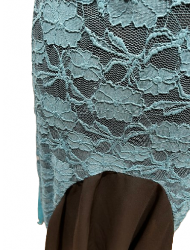 Beautiful tango dance dress in teal green stretch lace material with flounce back. This dress is an eye-catcher.