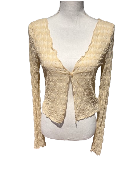 Süsser Tanz-Bolero aus Beige mit wellenförmigem Abschluss und langen Ärmeln.